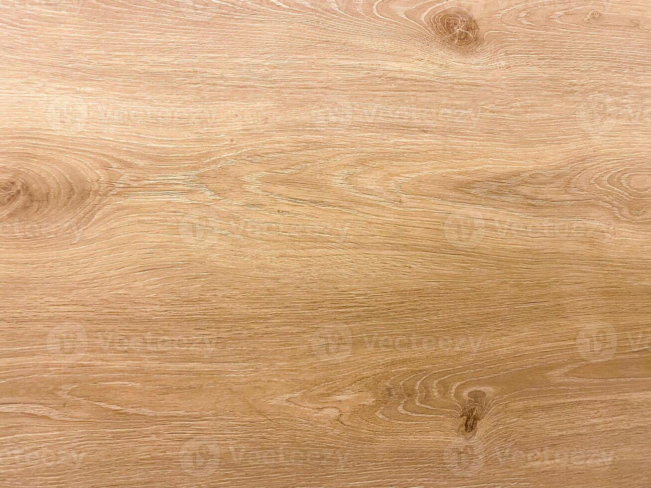 Plywood texture with a light, natural hue, creating a versatile backdrop for various designs. photo