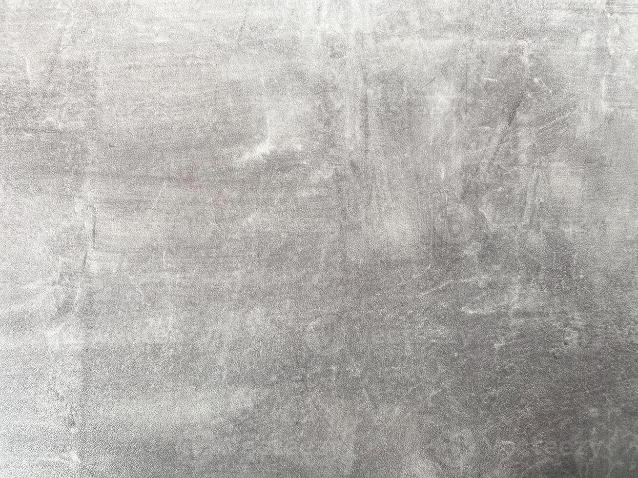 Grey and empty concrete wall, providing a neutral canvas for your creative endeavors. photo