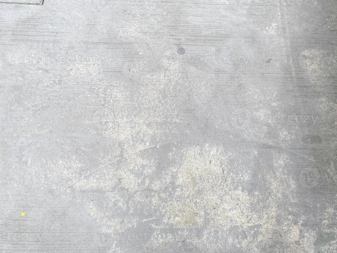A blank and white-painted concrete texture, offering a versatile backdrop for any project. photo
