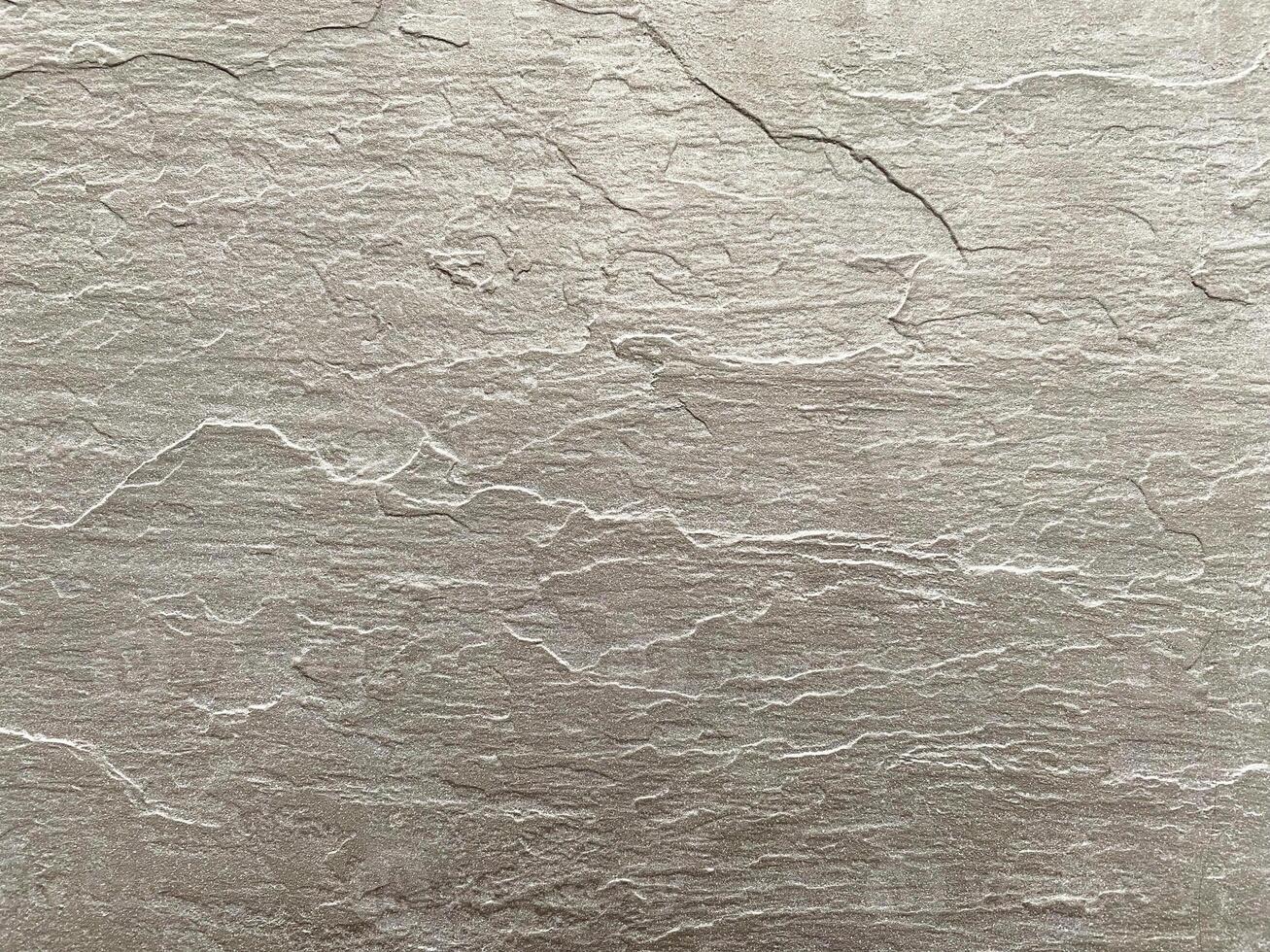 Concrete backdrop with a scratched and messy effect. photo