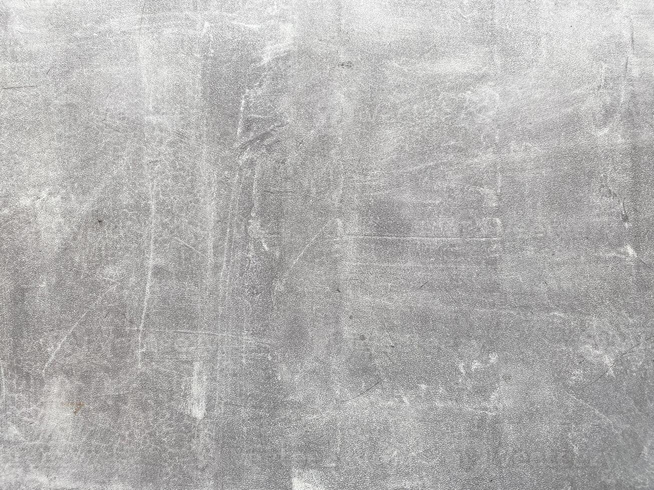 Grey and empty concrete wall, providing a neutral canvas for your creative endeavors. photo