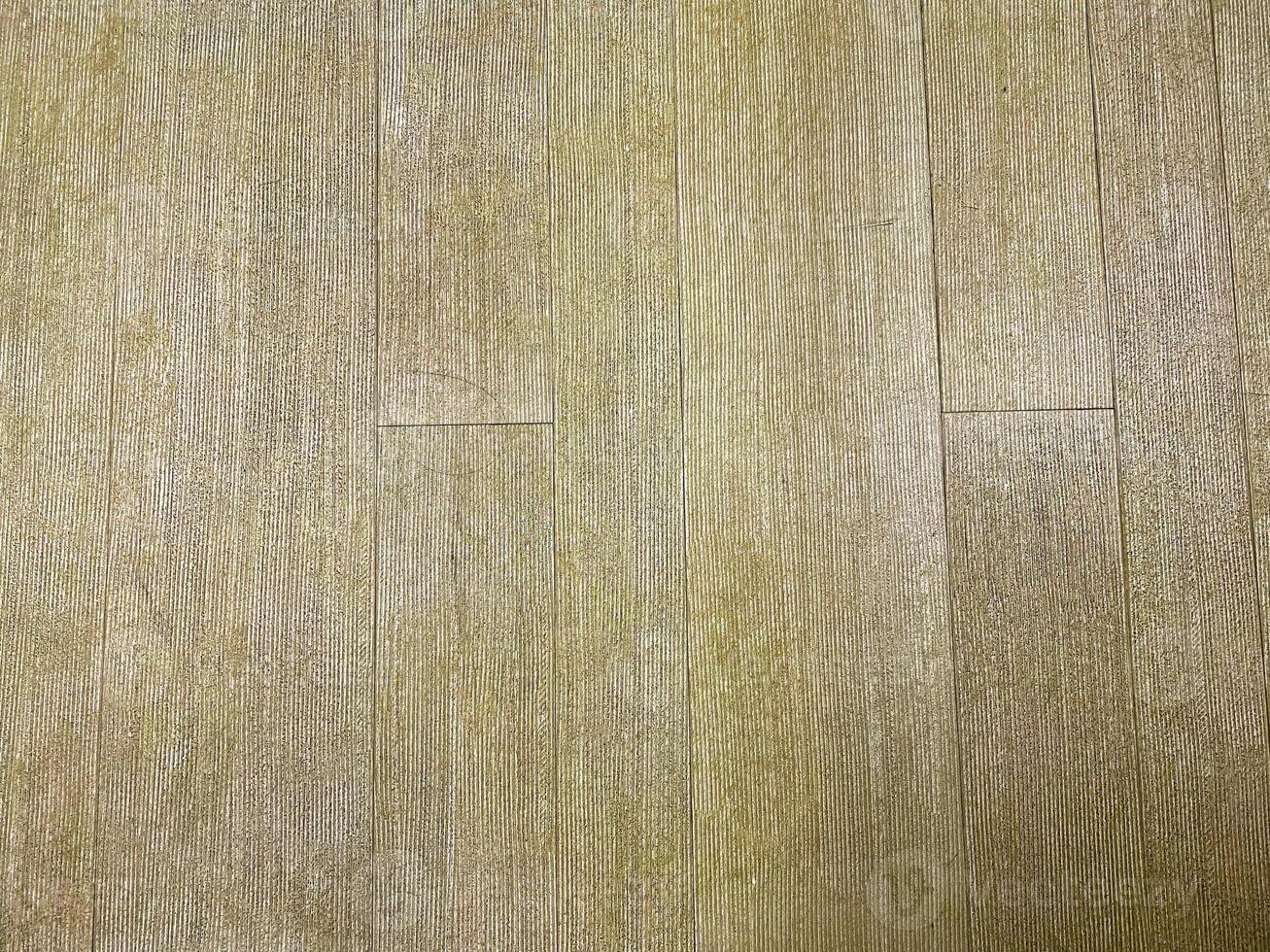 close-up shot of timber planks forming a seamless wooden floor surface. photo