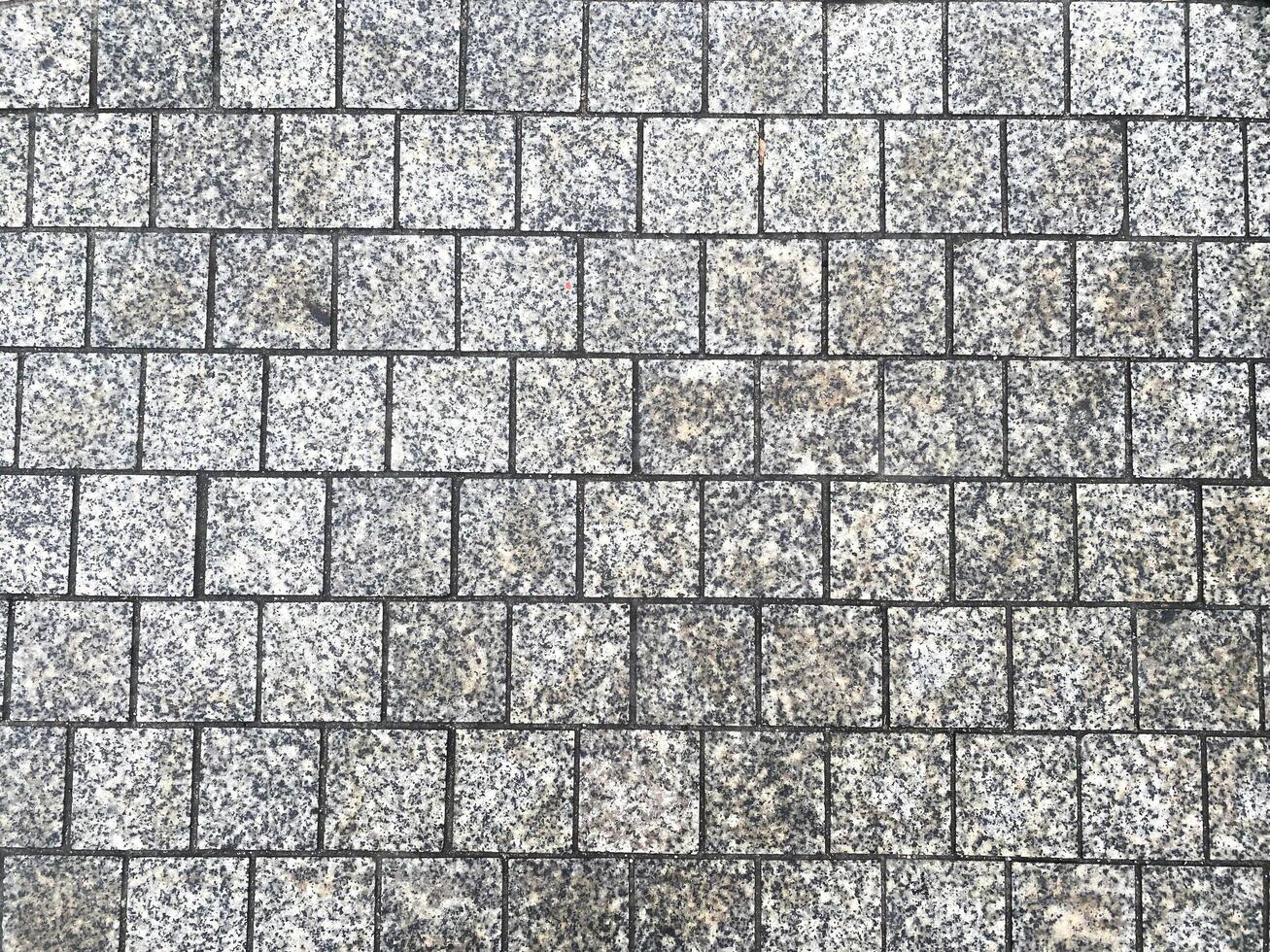 Banner template featuring a dark and scratched concrete surface, adding drama to your project. photo