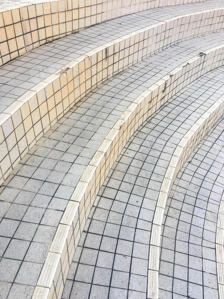 The perspective captures the upward movement, emphasizing the modern style of the stairway. photo