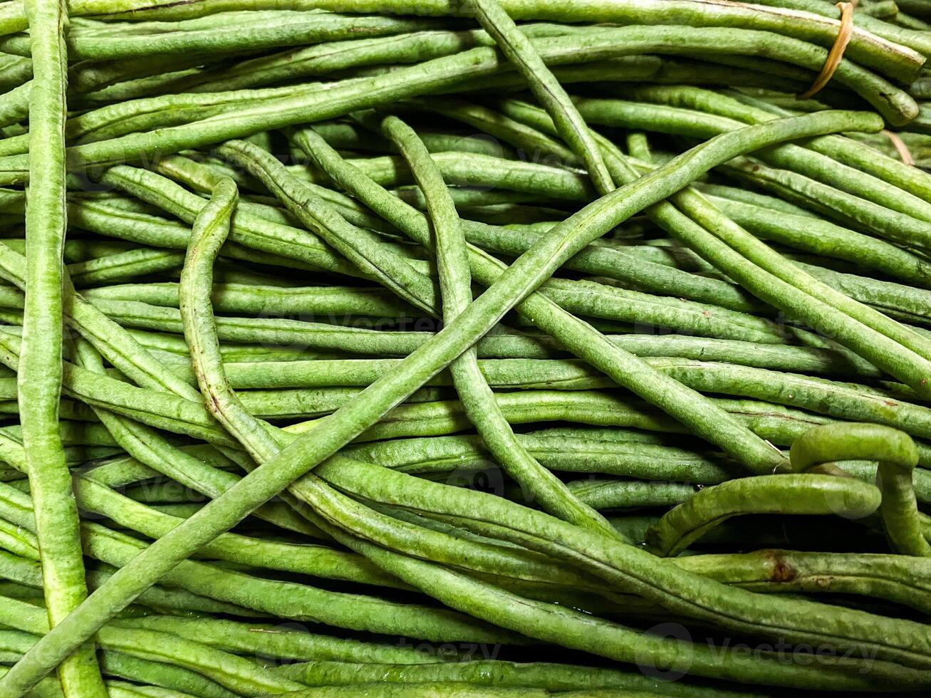 Close-up shot of Organic green Yardlong beans in th market photo