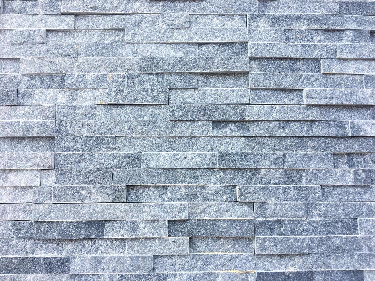 Dark concrete texture with a crumpled paper backdrop photo