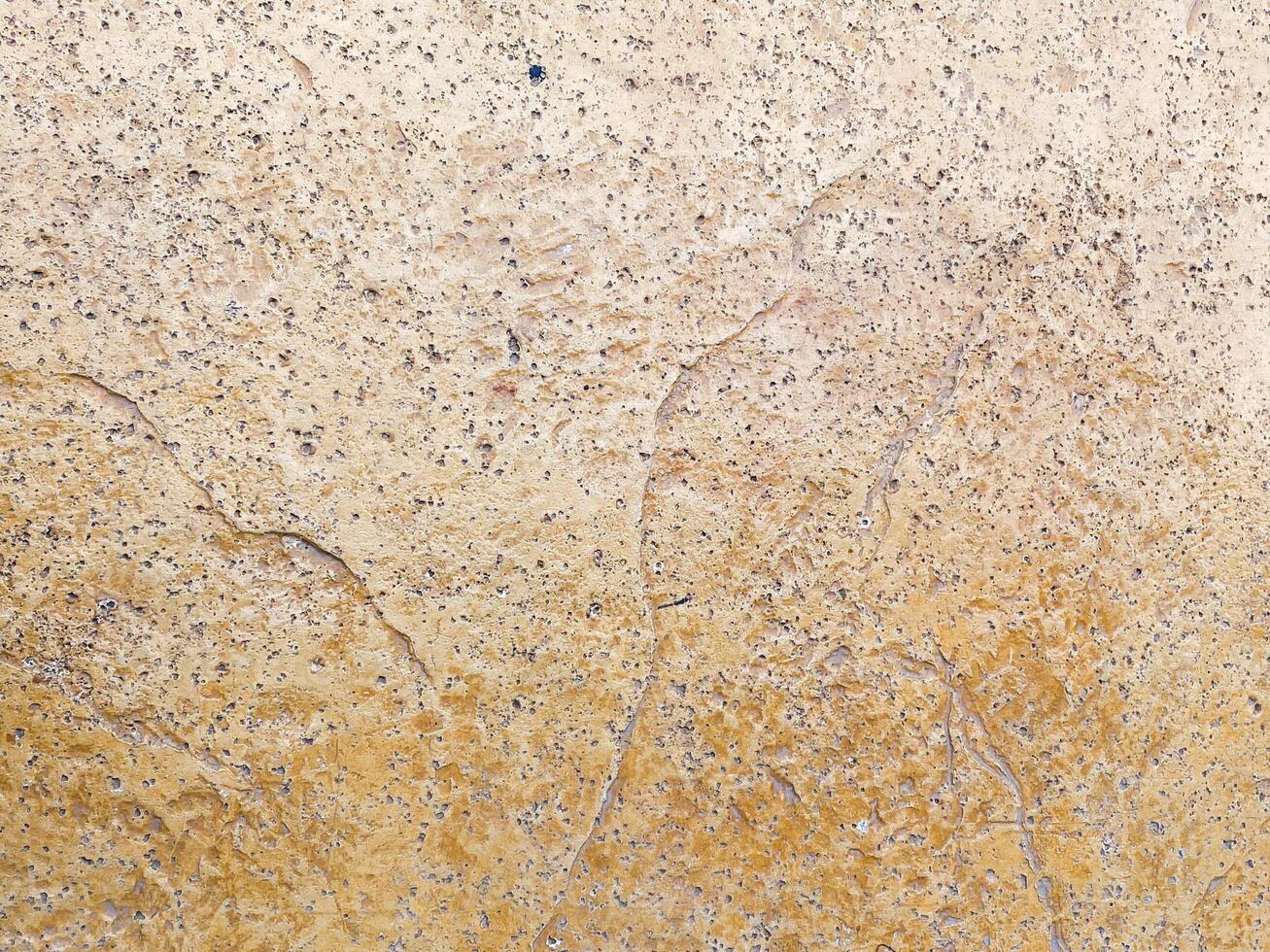 Dark concrete texture with a crumpled paper backdrop photo