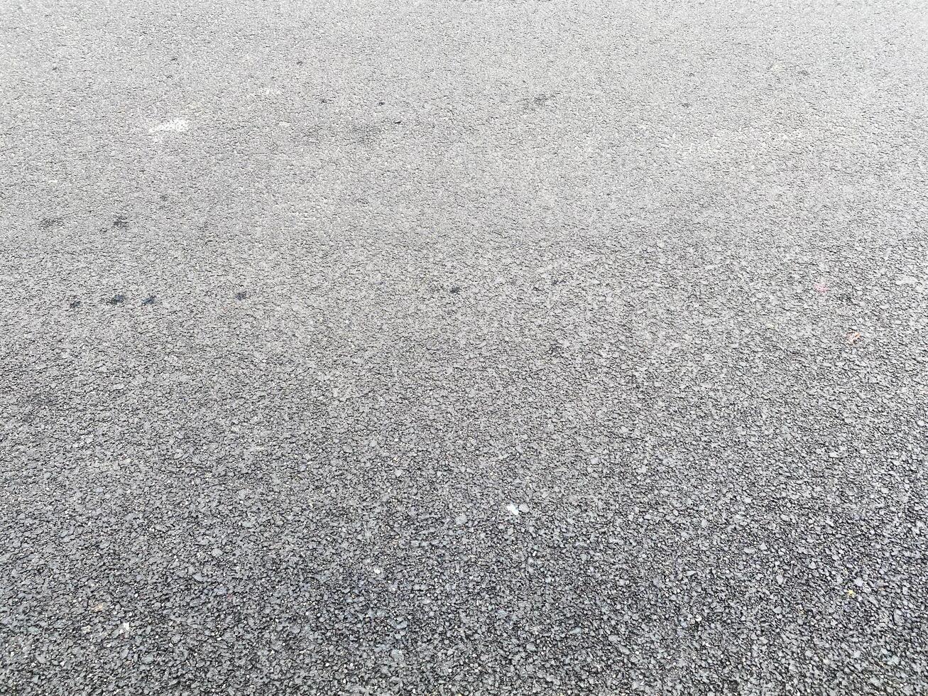 A closeup of an abstract concrete surface, perfect for creating eye-catching visuals. photo