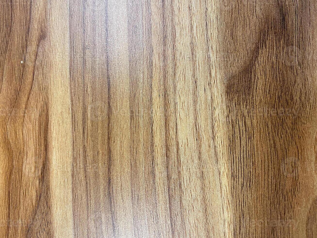 close-up shot of timber planks forming a seamless wooden floor surface. photo