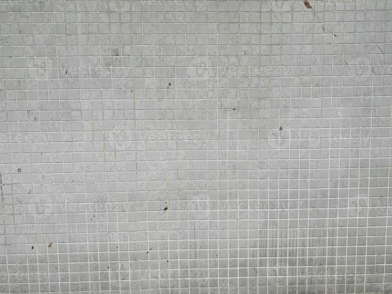 Scratched and messy concrete backdrop with space for design. photo