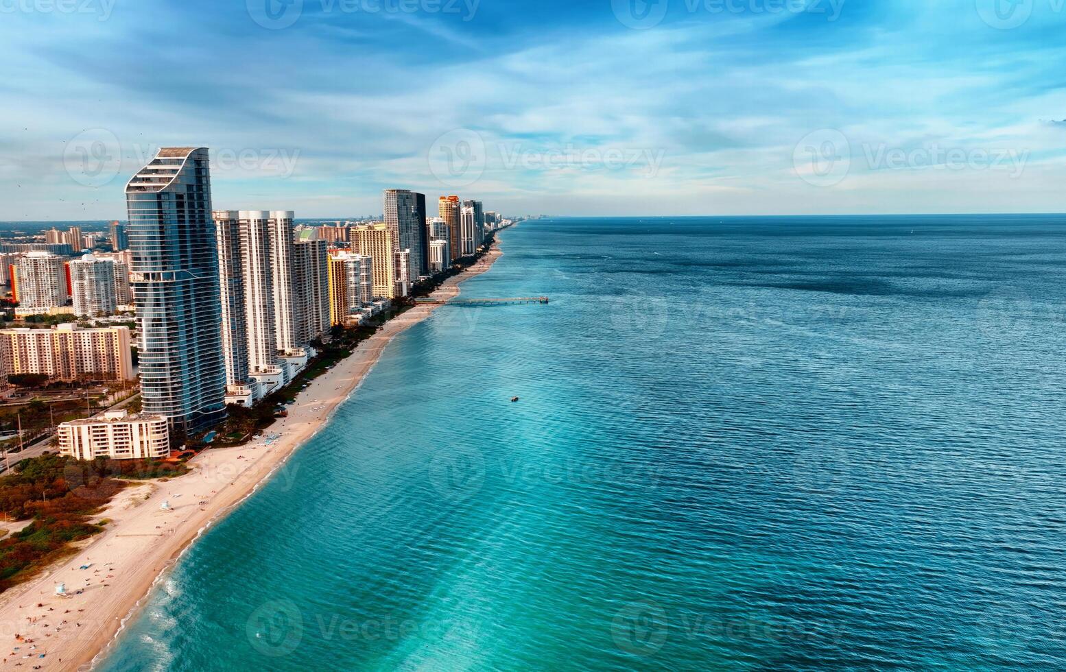 Aerial View of Miami Beach and City. A captivating aerial perspective showcasing the scenic beauty of Miami Beach and the bustling city. photo