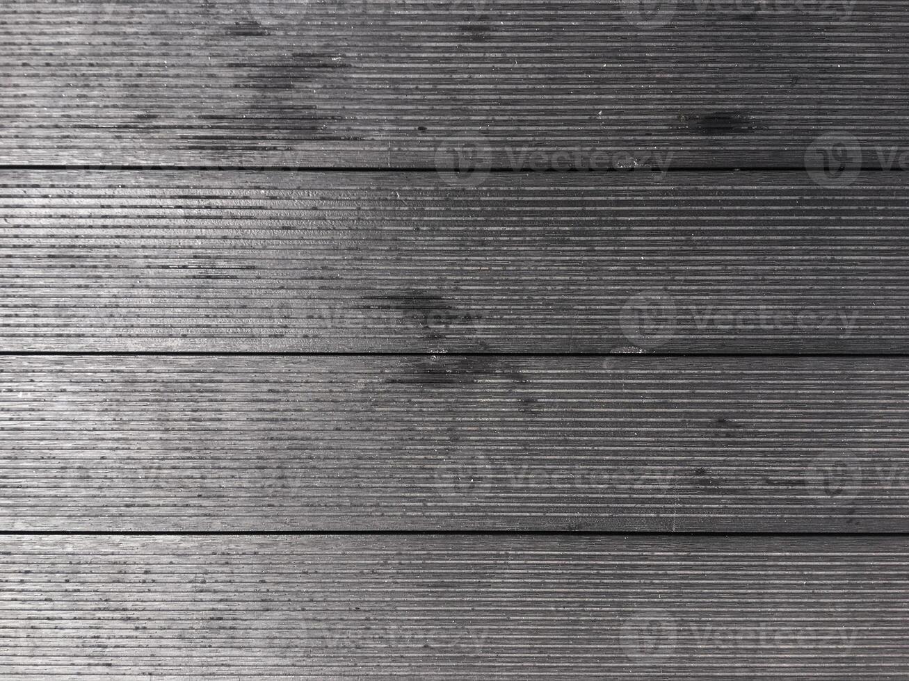 weathered and aged wooden backdrop creating a sense of history and character. photo