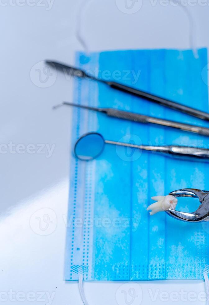 Tools for Every Task. A pair of scissors, a pair of pliers, and a pair of surgical photo