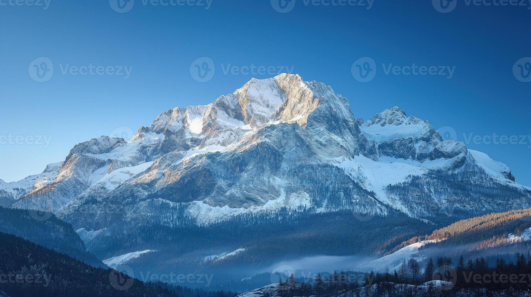 ai generado un asombroso nevadas montaña toma el sol en el calentar resplandor de amanecer, con claro azul cielo y brumoso bosques en el primer plano. foto