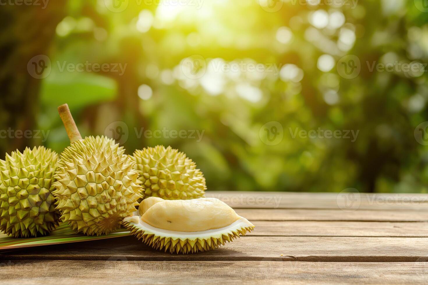 AI generated Fresh fruit durian on wood floor table with durian plantation background. King of fruit in thailand. Golden durian fruits concept. photo