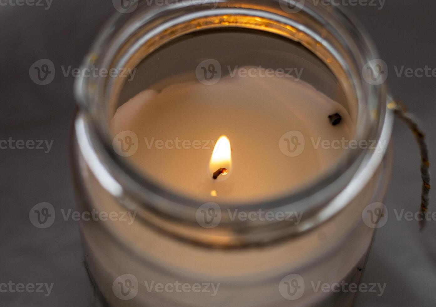 Close up shot of the burning candle. Concept photo