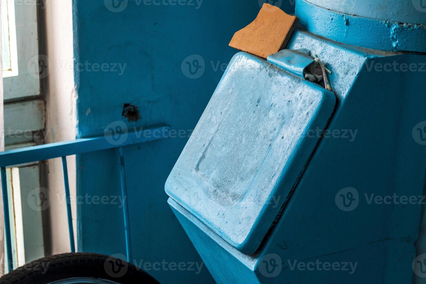 Shot of the garbage chute in soviet era corridor in the building. Concept photo