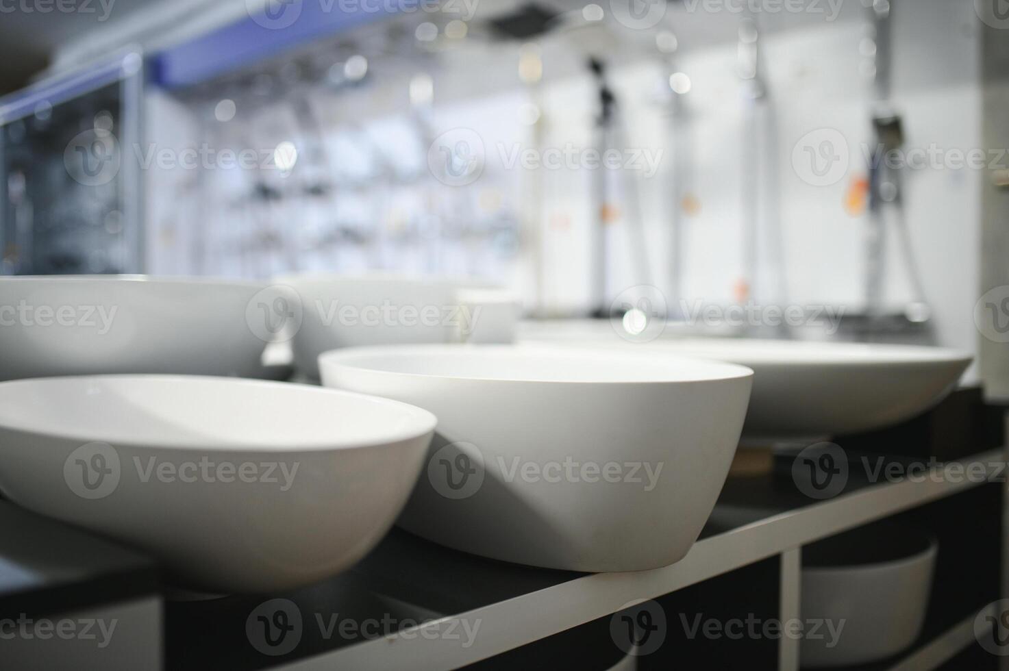 new bathroom sink at the plumbing shop with lots of sanitary goods photo