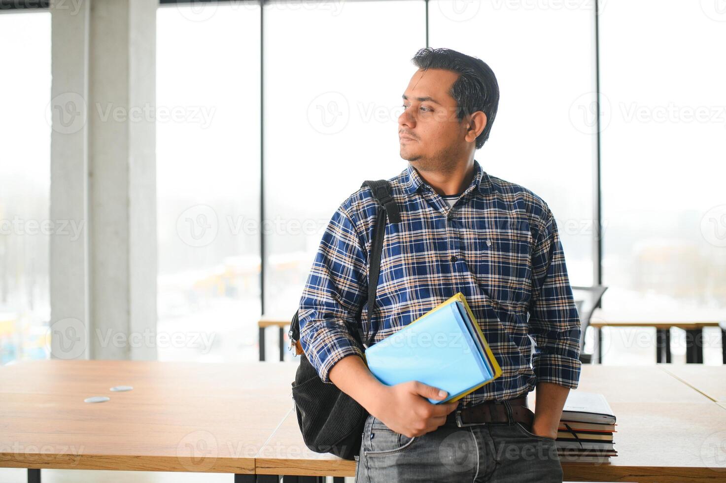 Portrait of a young Indian male student photo