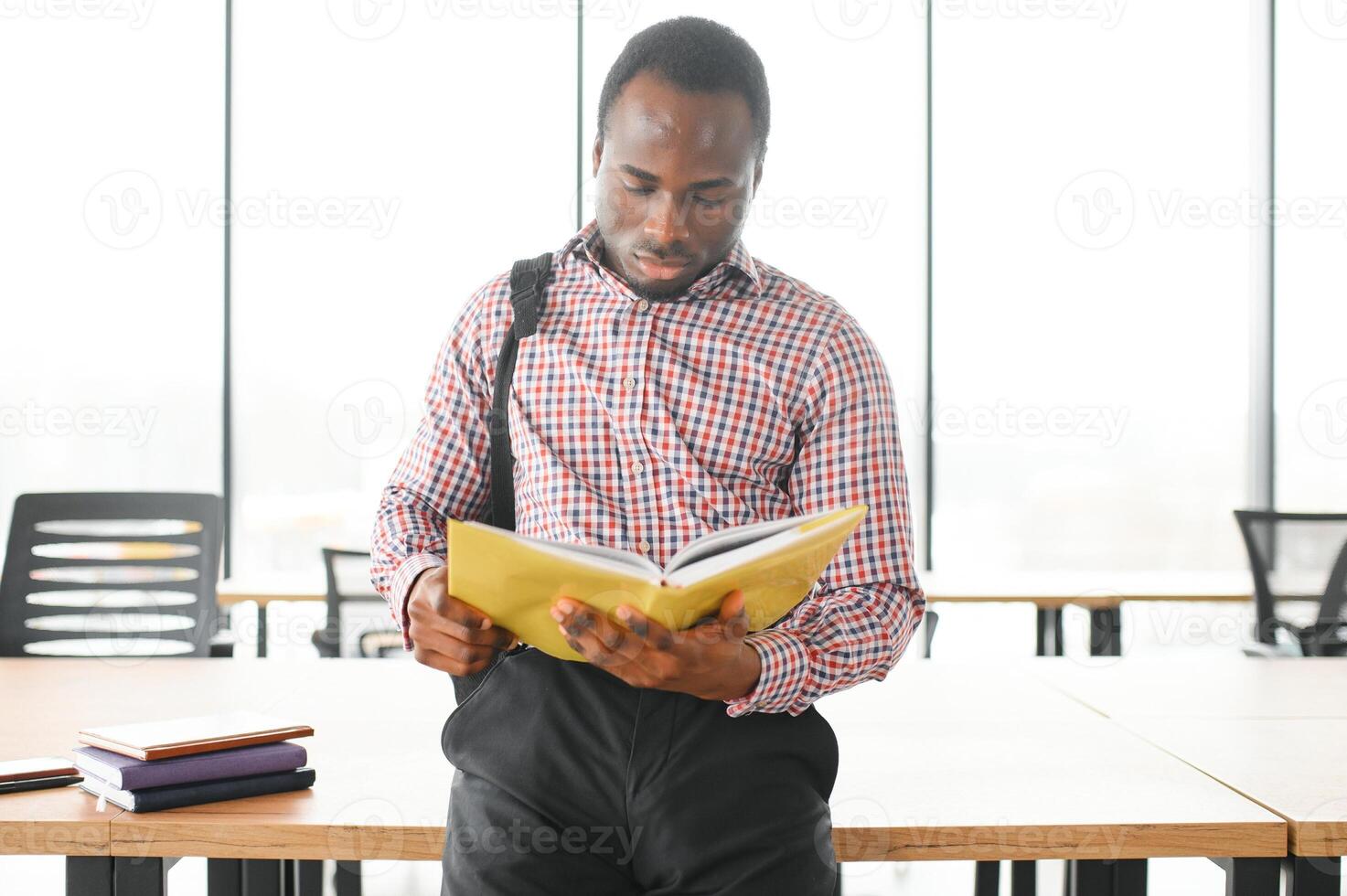 Portrait of african university student in class looking at camera photo