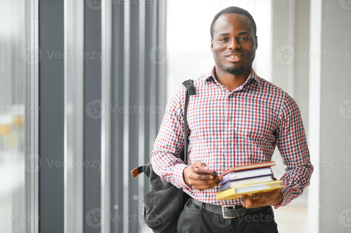 black student at university classroom and thinking of something photo