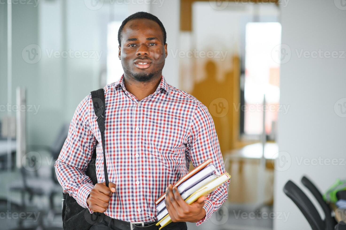 Portrait of african university student in class looking at camera photo