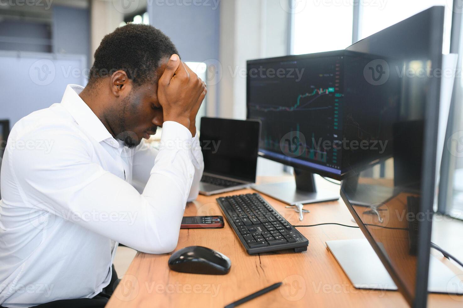 Sad African trader has failed in business. photo