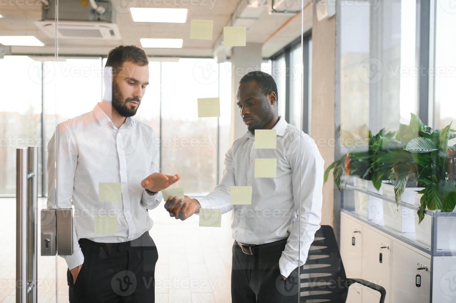 Corporate, sticky notes and business people planning a team mission, project or growth of business plan photo