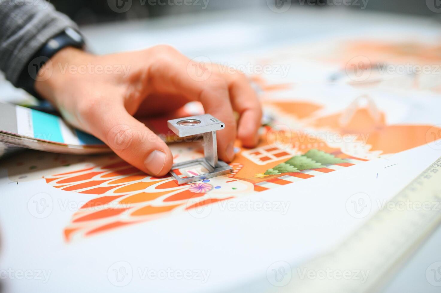 Printing house. The printer works in a modern production hall photo