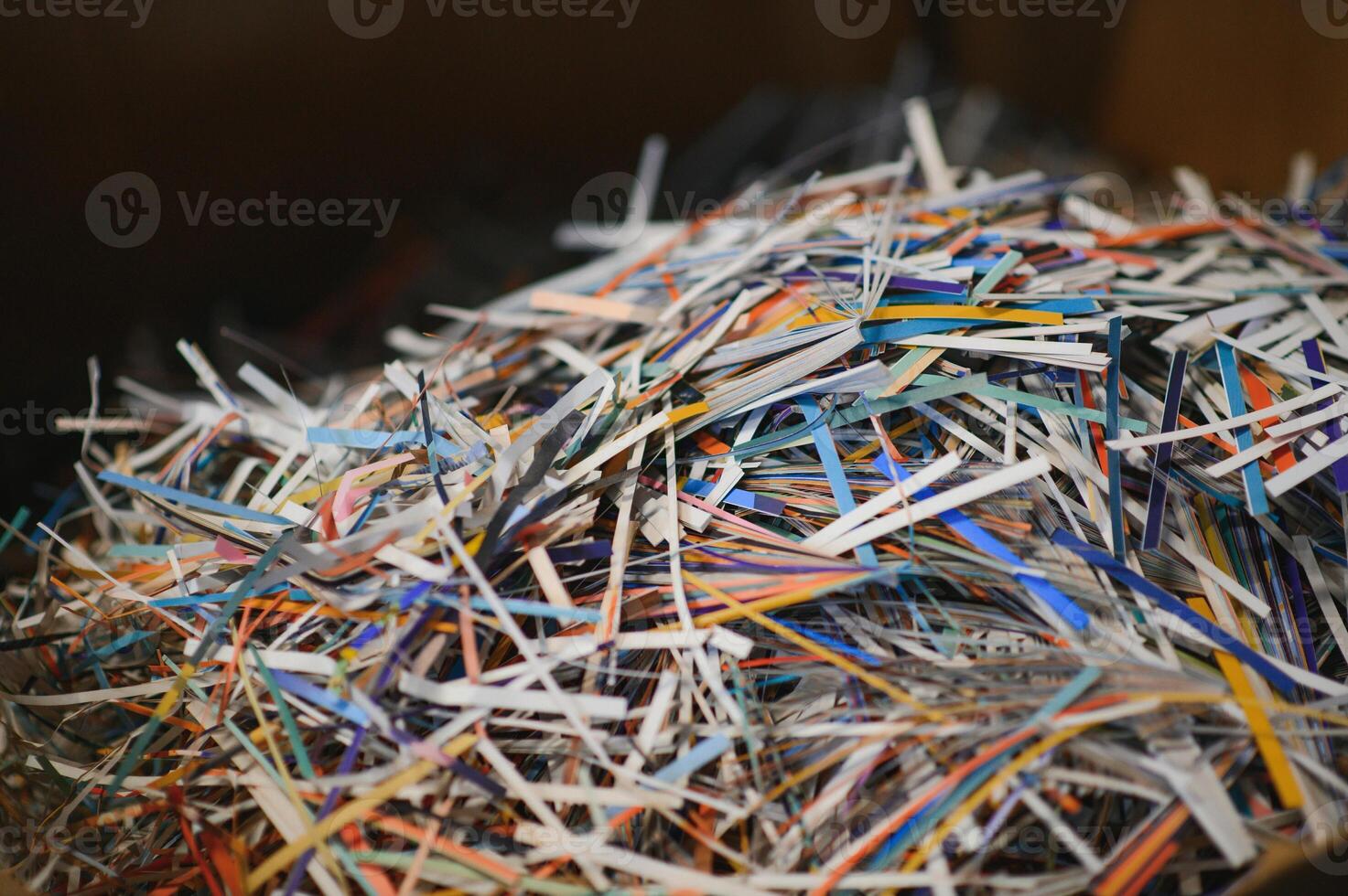 waste paper, scraps of printed materials in a modern printing house photo