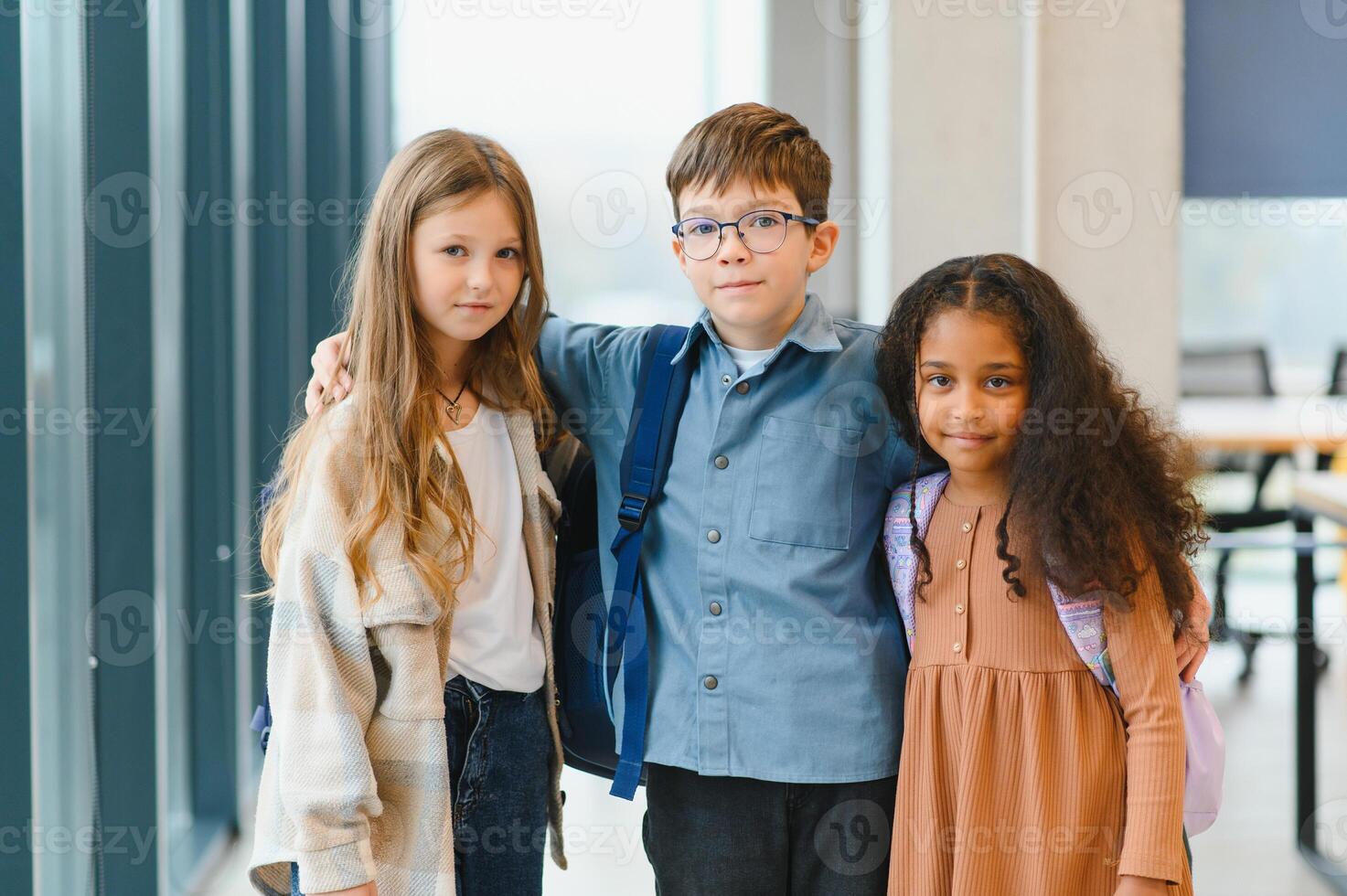 cheerful elementary school students. Back to school photo