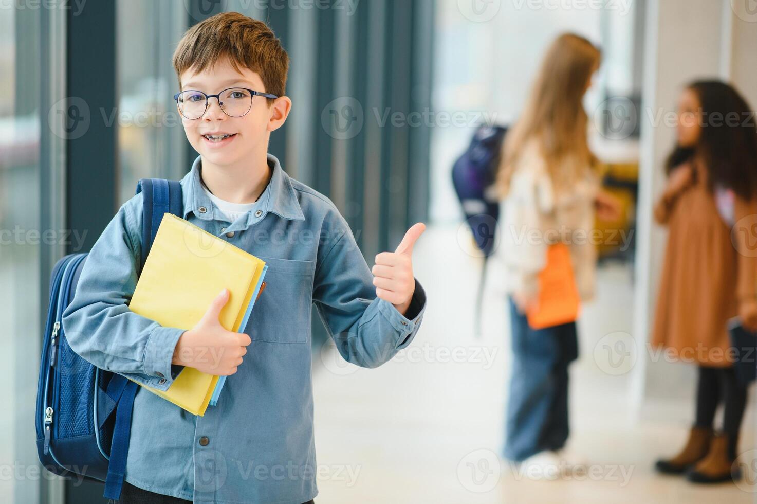 cheerful elementary school students. Back to school photo