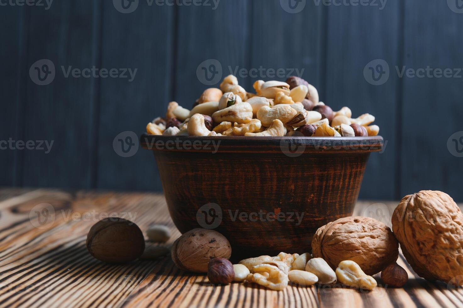 mix nuts on a wooden table photo