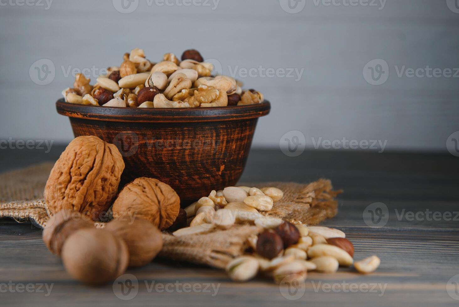 mix nuts on a wooden table photo