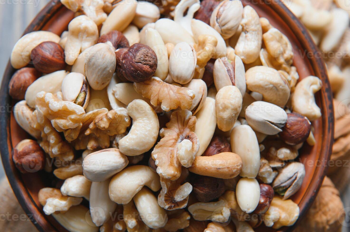 mix nuts on a wooden table photo