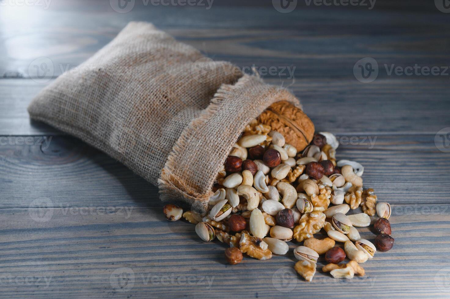 a mix of nuts in a craft bag photo