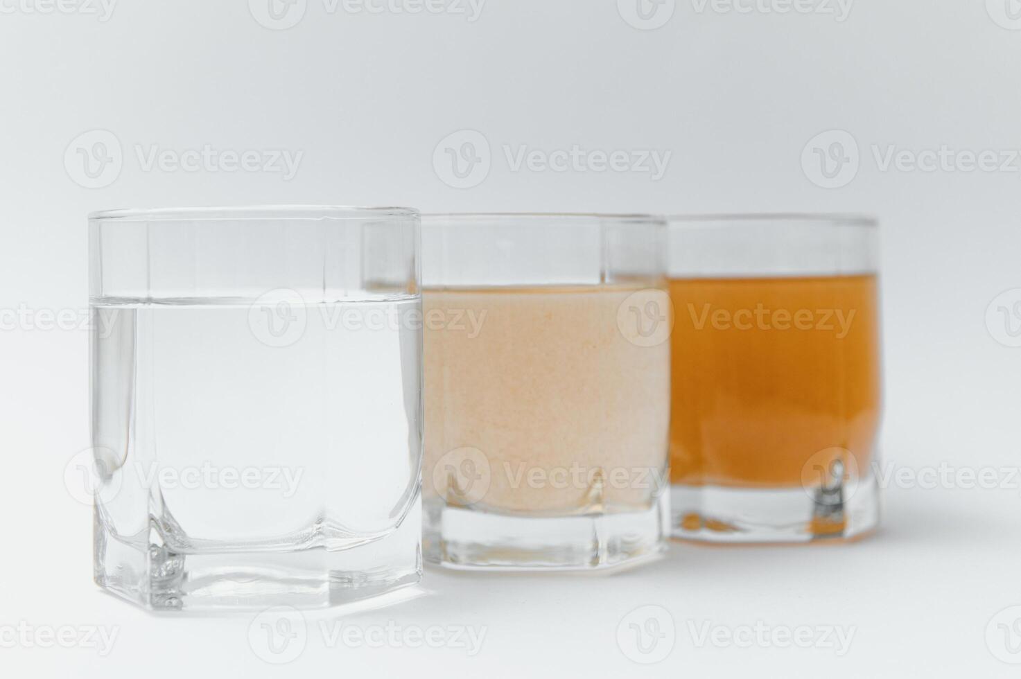 close up glasses with clean and dirty water. concept of water pollution. photo