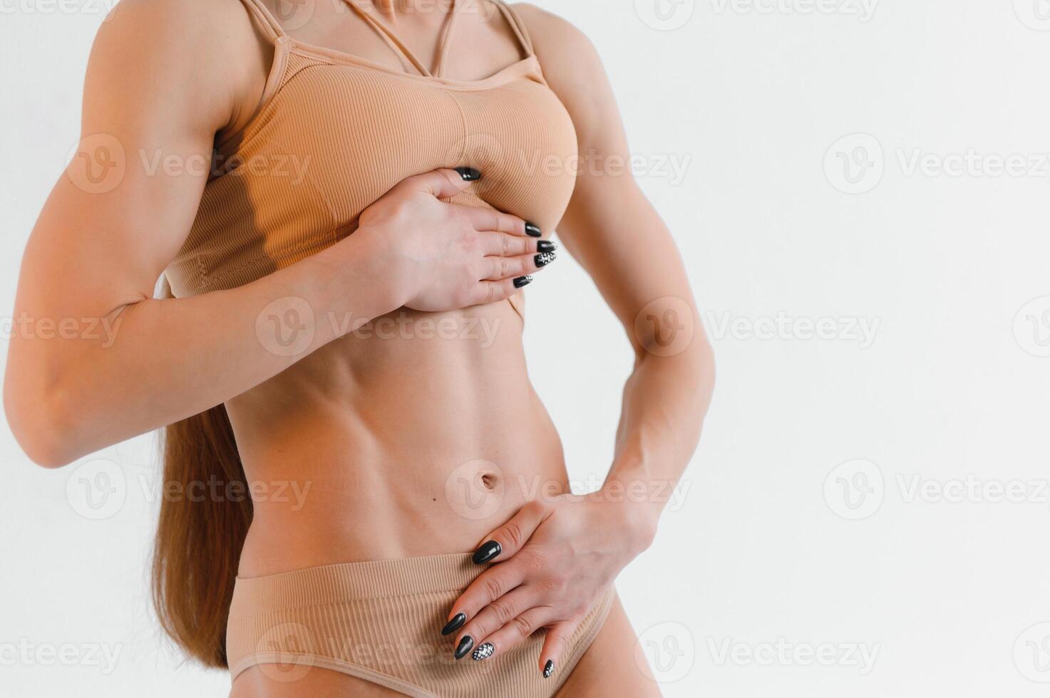 close up picture of woman trained abs photo