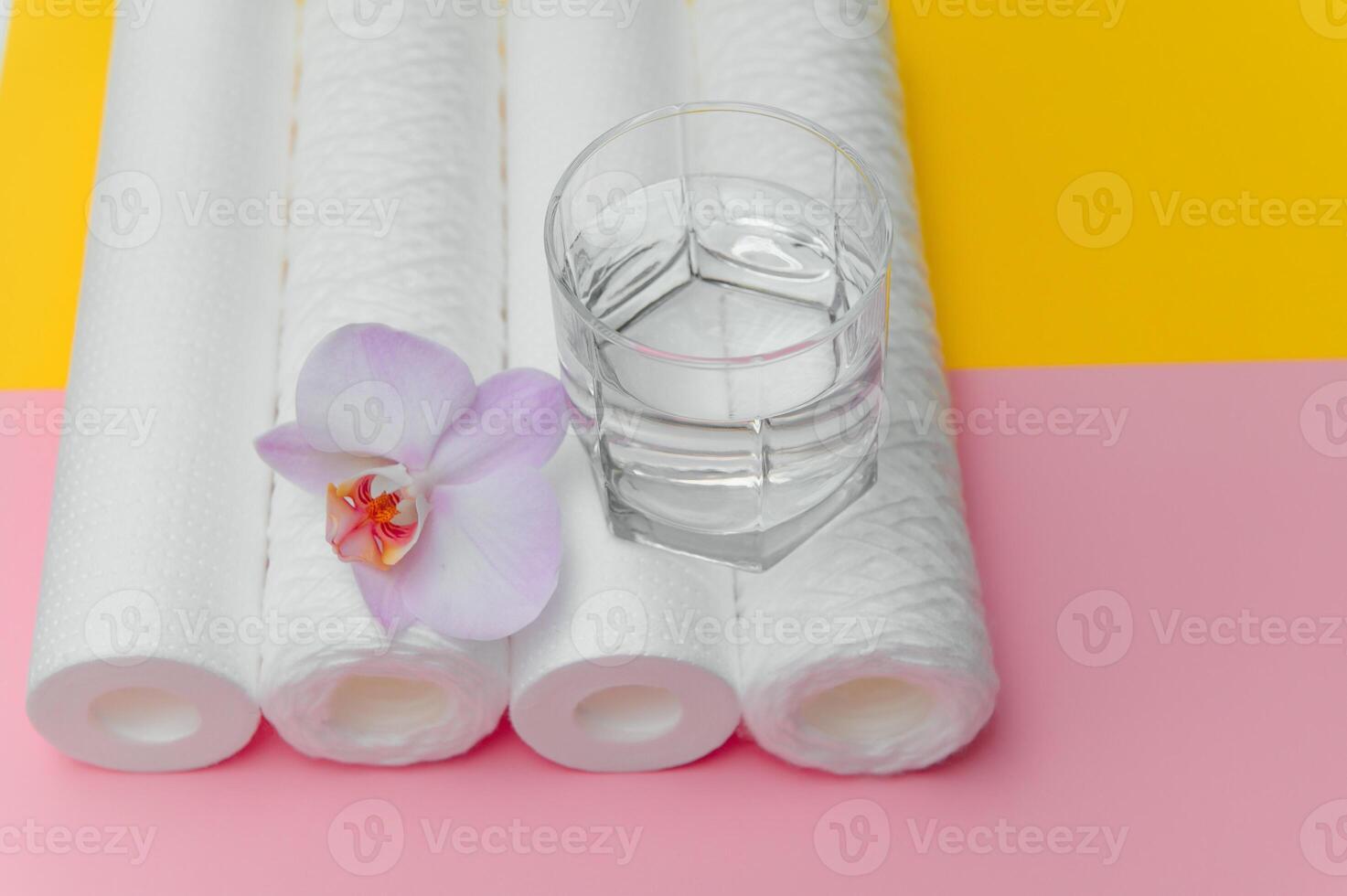 cartridges for water purification on a colored background. Concept of clean water at home photo