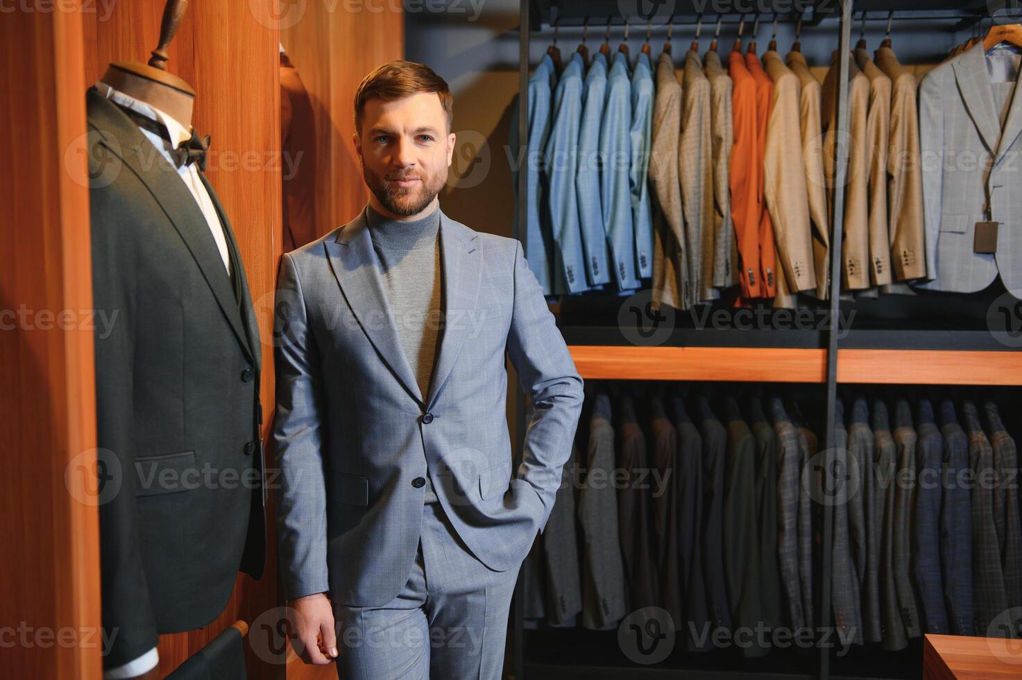 Perfect to the last detail. Modern businessman. Fashion shot of a handsome young man in elegant classic suit photo