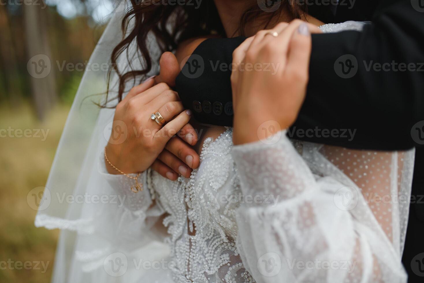 Hands of the bride and groom close-up. photo