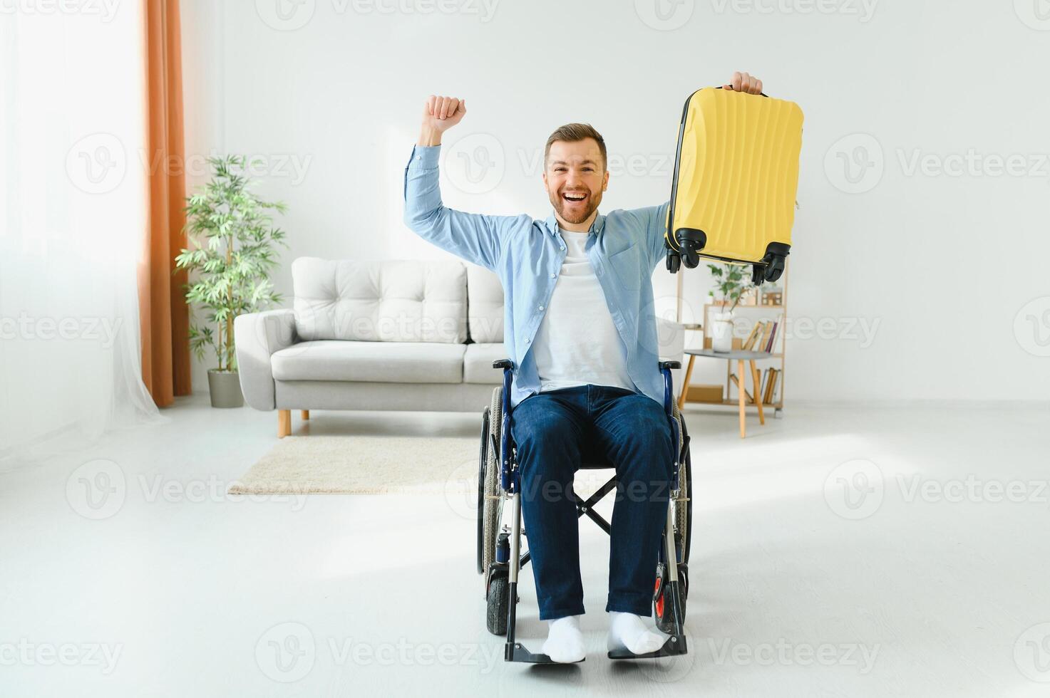 Young disabled man preparing for summer vacation. photo