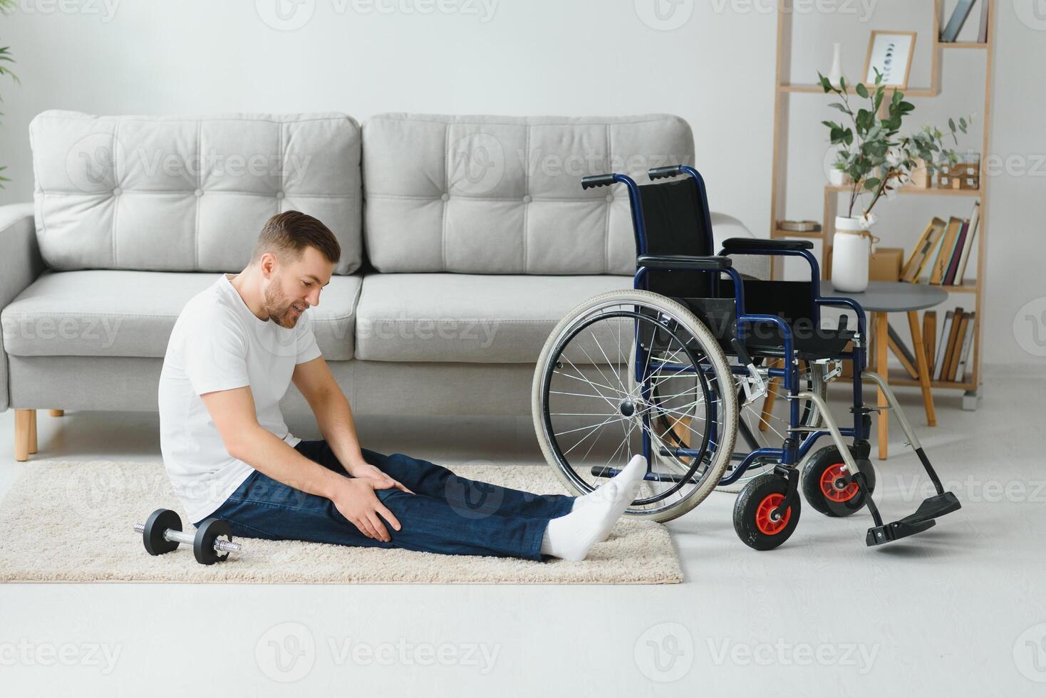 Disabled sportsman doing stretching and exercises on wheelchair background. Life of a disabled person photo