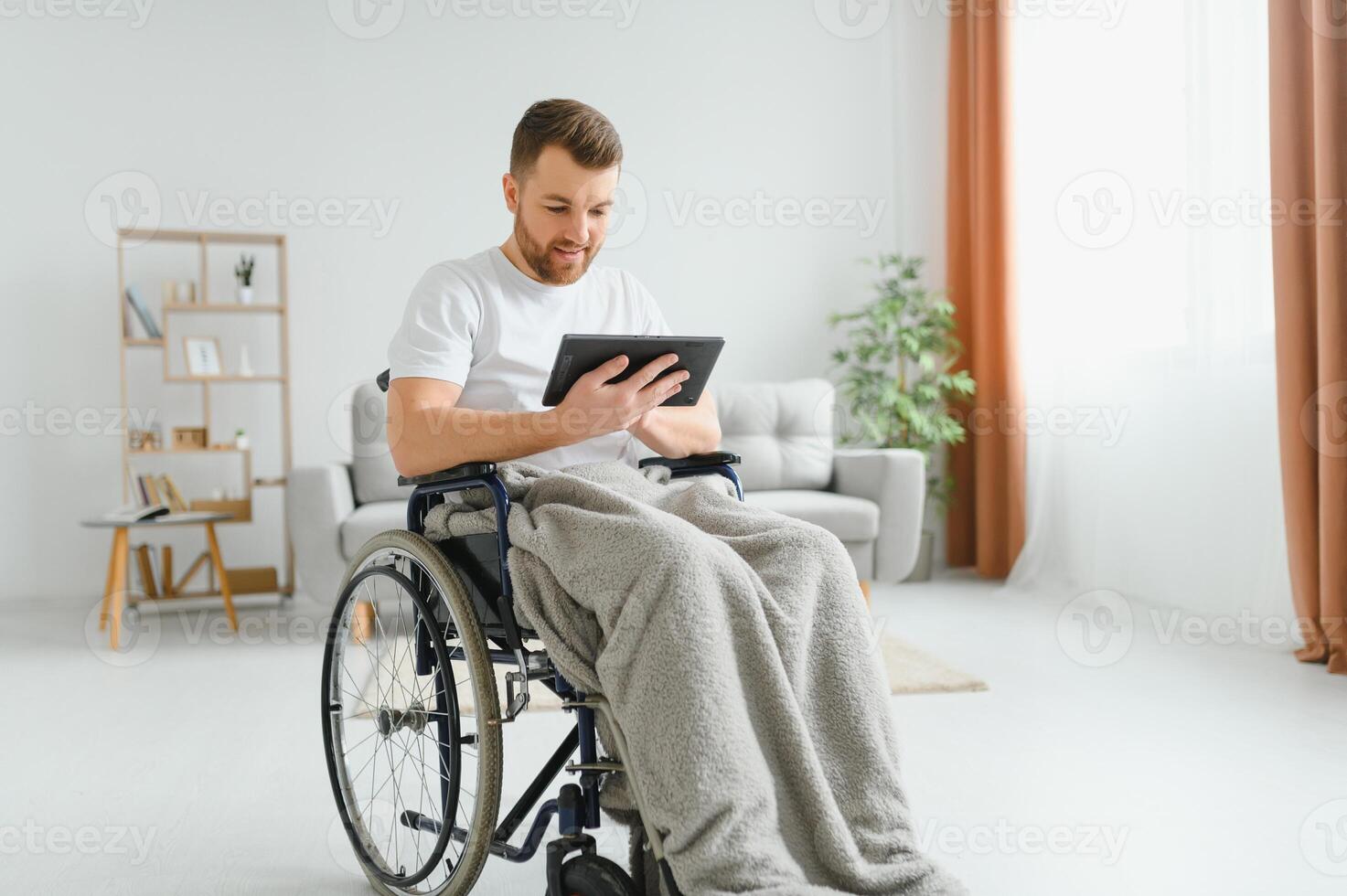 Young handsome man in wheelchair photo