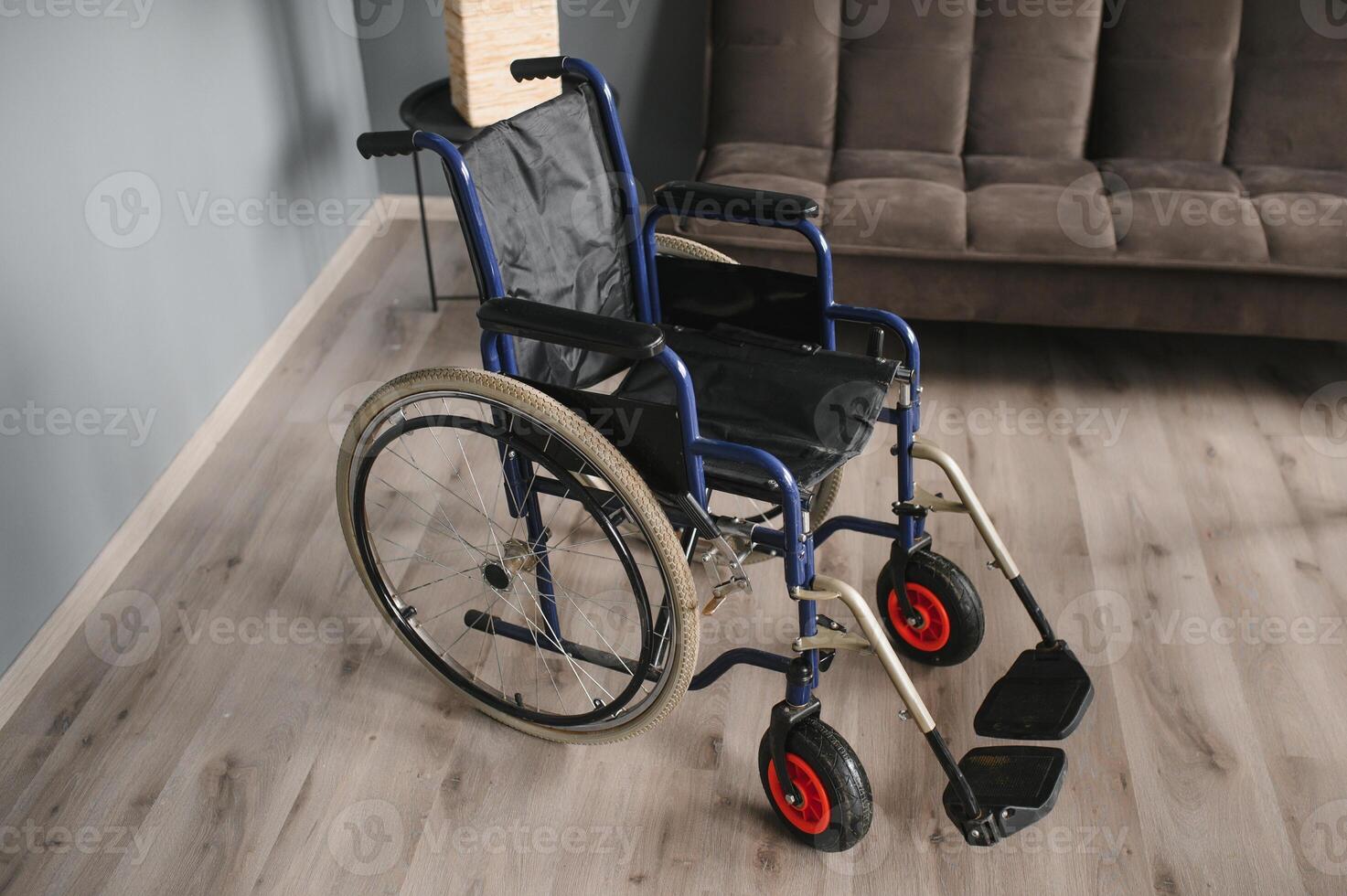 Modern Empty Wheelchair stand in Room photo