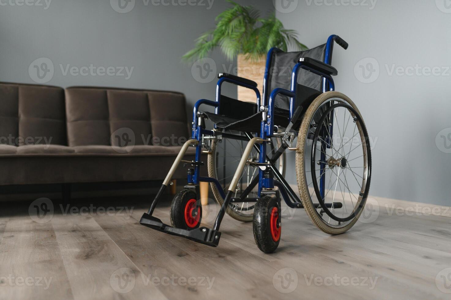 Modern Empty Wheelchair stand in Room. photo