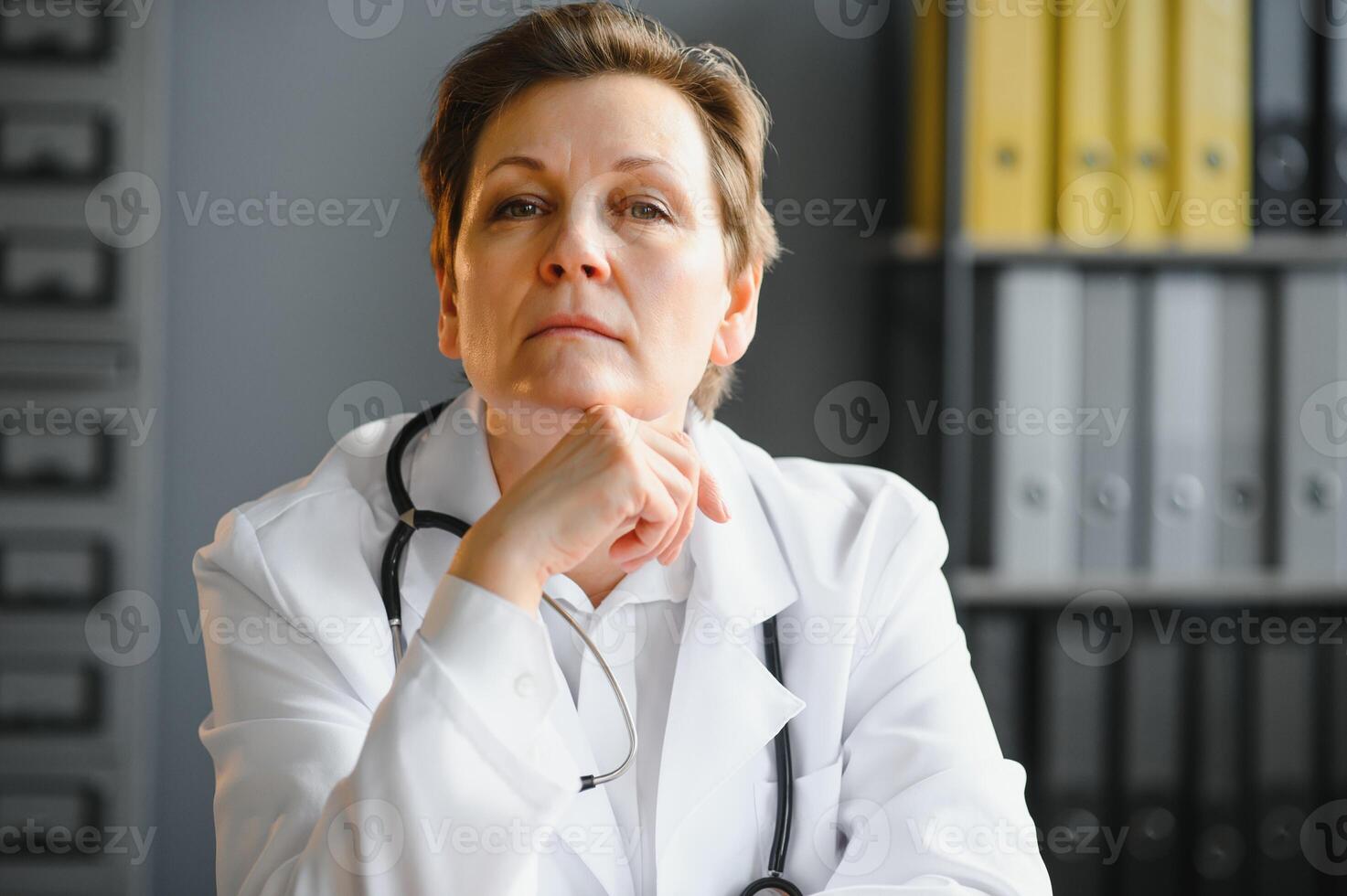 Portrait of a middle aged female doctor photo