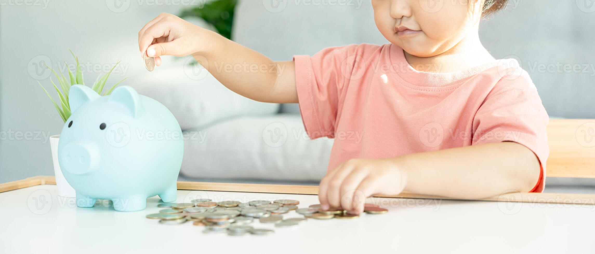 Save money. children putting coin for saving. wealth, Finance, insurance, investment, education, future, plan life, learn, banking, family, health, health and accident insurance. photo