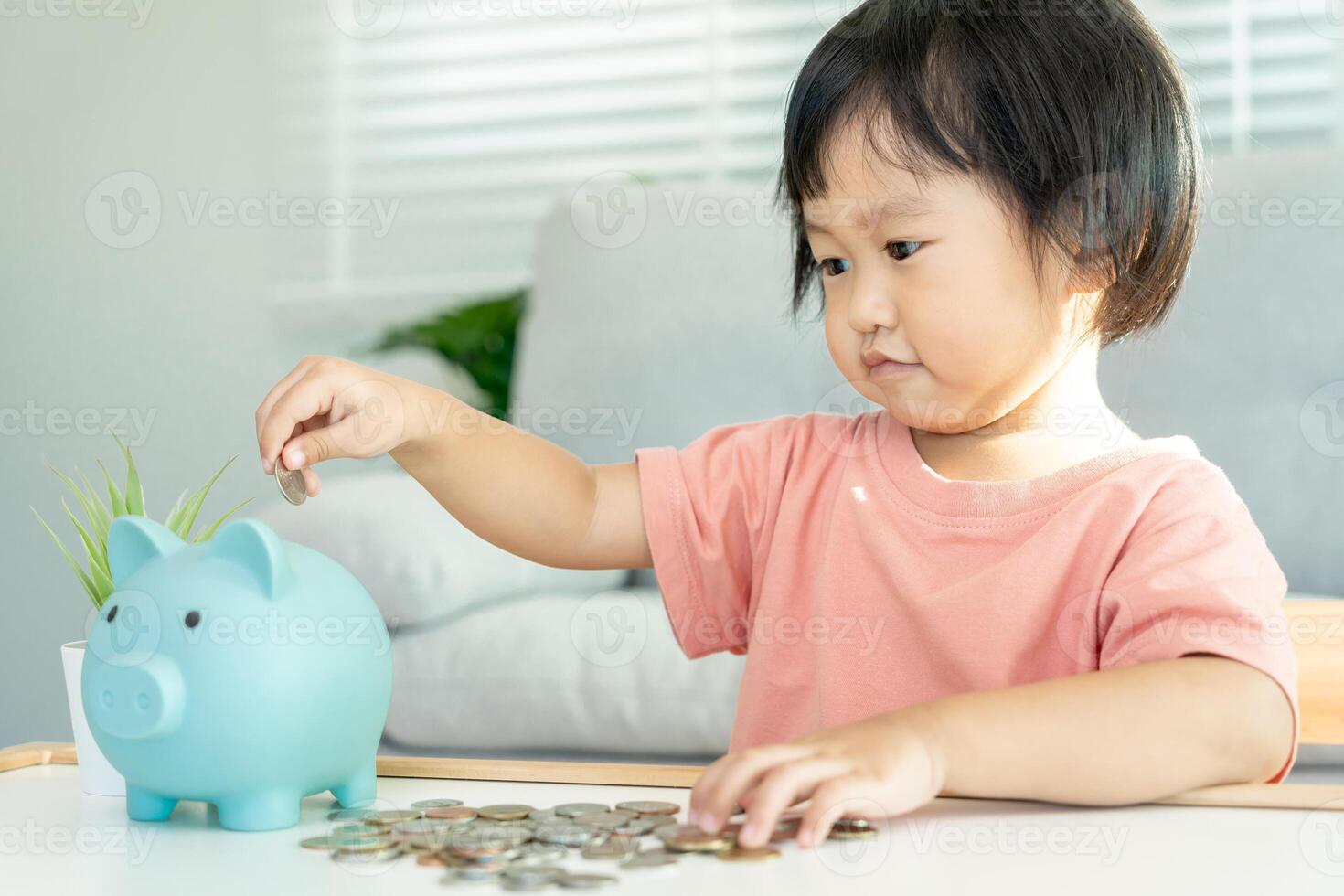 Save money. children putting coin for saving. wealth, Finance, insurance, investment, education, future, plan life, learn, banking, family, health, health and accident insurance. photo