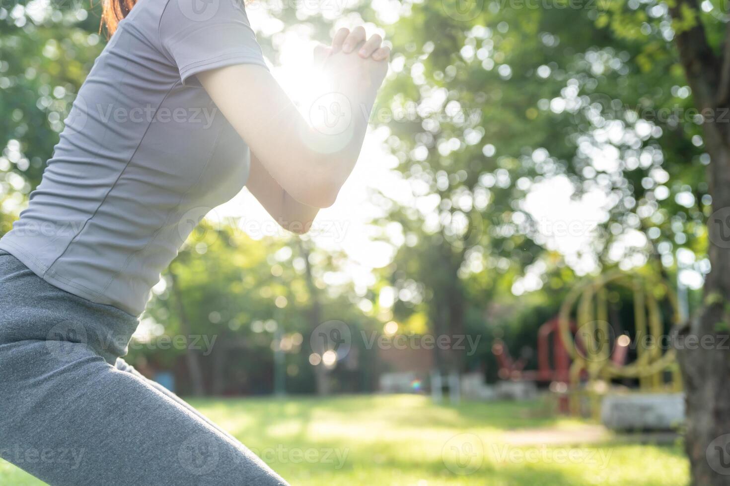 health care female exert on the park. Asian woman doing exercises in morning. balance, recreation, relaxation, calm, good health, happy, relax, healthy lifestyle, reduce stress, peaceful, Attitude. photo